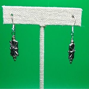 Mixed metal with Sterling Post. Artisan made